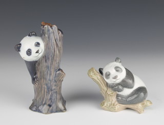 A Royal Copenhagen figure of a panda climbing a tree 664 5" and a Lladro figure of a panda sleeping on a branch 3" 