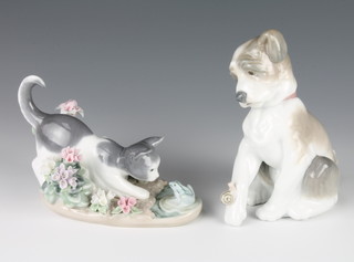 A Lladro group of a cat with frog 1442 5", a do. hound with snail 5 1/2" 