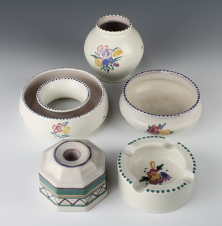 A Poole Pottery octagonal candlestick with Carter Stabler stamp and geometric design 4", do. shallow bowl with flowers 4 1/2", a Poole Pottery ashtray 3", squat vase 4" and posy bowl 5" 