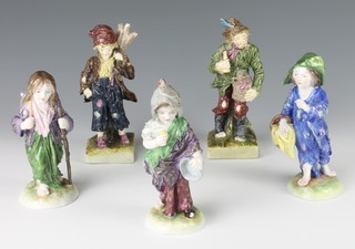 Three 20th Century German porcelain figures of children 5", 2 earthenware do. of street sellers 5 1/2"