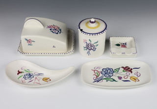 A Poole Pottery cheese dish and cover decorated flowers 5", do. preserve pot and lid, an ashtray and 2 shaped dishes
