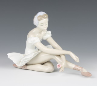 A Lladro figure of a seated ballerina 8 1/2" 