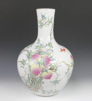 An impressive Chinese 20th Century baluster vase with tapered neck decorated with peaches and script amongst bats, blue character mark to the base 21"h 