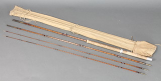 A vintage unnamed 13' split cane salmon fishing rod with 2 tips