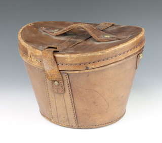 A Victorian oval brown leather top hat box 9" x 13" x 12" 