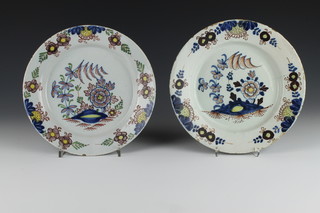 A matched set of 4 18th Century Liverpool Delft polychrome dishes decorated with flowers enclosed in floral borders 9" 
