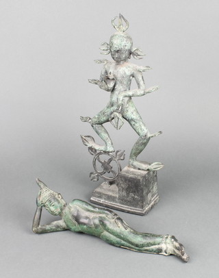 An Eastern bronze figure of a dancing deity 15" together with a bronze figure of a reclining Buddha 