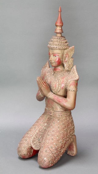 A Thai carved and gilt painted figure of a kneeling temple attendant 27 1/2"h 