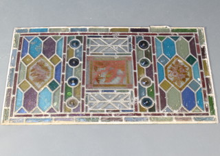 An Edwardian Art Nouveau rectangular stained glass panel decorated with a bird and flowers 20" x 36" 
