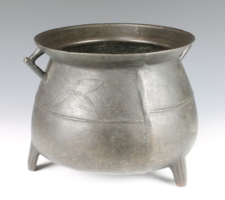 A late 17th Century leaded bronze cauldron, attributed to John Sturton I of South Petherton, Somerset, having a flared rim, cast a single wire to the body and pair of handles, with foundry marks of a 'Chinese I' and the four-arc mark, on three ribbed outswept supports 9 1/2"x 11 1/2"diameter