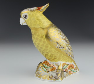 A Royal Crown Derby Imari pattern paperweight  Citron Cockatoo with gold stopper 5 1/2 