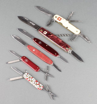 Pradle, a French 2 bladed jack knife fitted a corkscrew, a French unmarked 6 bladed jack knife with 2 blades, bottle opener, tin opener, spike and corkscrew, 2 jack knives with knife, scissors and file and 2 other pocket knifes

