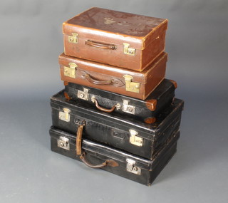 Wright, a vintage black leather suitcase with chrome mounts 7" x 26" x 15 1/2", a similar suitcase 7" x 26" x 16", a black fibre suitcase with chrome locks 5" x 22" x 12", a brown leather suitcase with brass locks the top marked R.AC 6" x 20" x 12", a brown leather vanity case (no fittings) with brass mounts 7" x 18" x 13"  