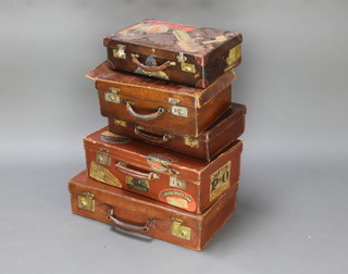 A brown leather attache case with gilt metal mounts and numerous labels 5" x 16" x 11" (lock damaged), a brown leather vanity/travelling case with chrome mounts the top marked Mrs G H Grant 5 1/2" x 16" x 11" (side damaged), a brown attache case with brass mounts 4" x 18" x 11" (some scuffing), an attache case with luggage labels Cunard White Star, Eastern and Southern Railways and 3 others 7" x 20" x 12" together with a brown suitcase with gilt metal locks 5" x 22" x 13" 