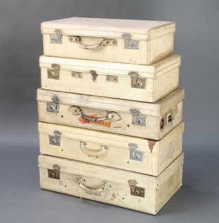 A parchment suitcase retailed by Harrods with brass locks 8" x 28" x 17" (some scuffing), a W H Stanley parchment suitcase with chrome locks with 13 luggage labels 7" x 28" x 15", a Pendragon parchment suitcase with chrome locks 7" x 28" x 15", a parchment suitcase with chrome mounts 7" x 24" x 15" (stitching loose in places) and a parchment suitcase (handle missing) 7" x 26" x 15", all scuffed