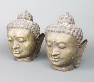 A pair of Eastern bronze portrait busts of Buddha 9" 