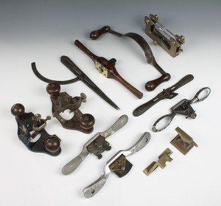 A 19th Century spokeshave 13", a Prestons patent spokeshave, a Wonder steel spokeshave, a Stanley steel spokeshave, 1 other spokeshave, a Stanley no.74 router plane, a Record no. 071 router blade, a wooden and brass twin handled router plane, a Masons compass etc 