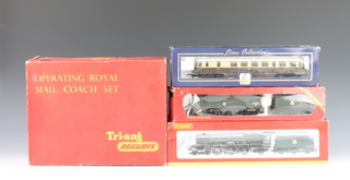 A Hornby OO gauge Battle of Britain class locomotive and tender Tangmere boxed, a Hornby OO gauge locomotive and tender Princess Class Margaret Rose R2226 boxed, a Lima double headed diesel locomotive together with a Triang operating Royal Coach set