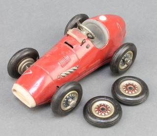 A Schuko no.1070 Grand Prix racer together with 2 spare tyres (no key and missing wing mirrors)