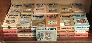 37 Lumar 1940's  jigsaws of various subjects including Military, aircraft, Country scenes etc