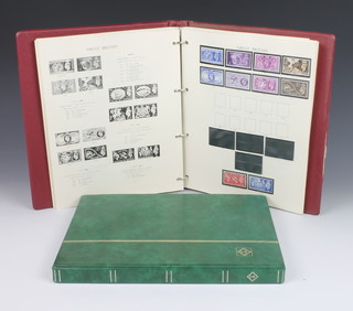 A Windsor stamp album George V to Elizabeth II mint stamps and a stock book of George VI to Elizabeth II mint stamps 