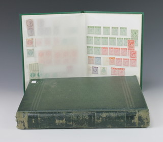 A green stock book of Victorian and later GB mint stamps and a green stock book of Elizabeth II sheets, stamp blocks, 48 Olympic Games, postal union etc  