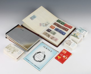 A quantity of various Elizabeth II mint stamps, Royal Mail and presentation stamps together with a small stock book