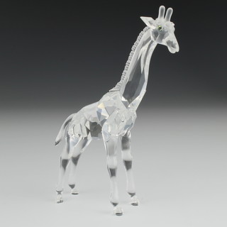 A Swarovski Crystal figure of a standing giraffe 5", boxed 