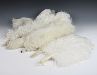 An ivory and ostrich feather debutants fan - handle f, do. feather bower and a white fox fur