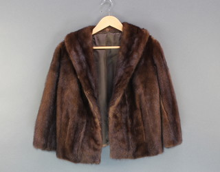 A lady's dark mink three-quarter length fur coat (some moult)