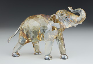 A Swarovski coloured crystal standing elephant, 7 1/2" boxed