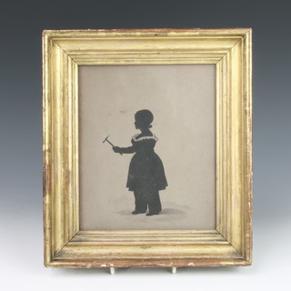 A 19th Century silhouette miniature of a young boy holding a hammer 8" x 6 1/2" 