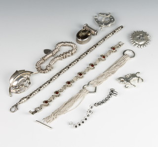 Two silver brooches, a bracelet and minor silver jewellery