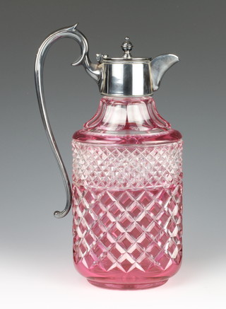 A cranberry flash glass ewer with plated mounts 12"