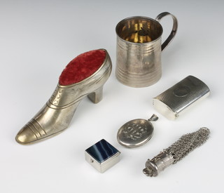 A silver plated engine turned vesta case, a mug and 4 other items