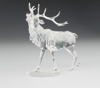 A Swarovski Crystal figure of a stag 4", boxed