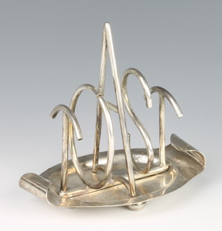 A 1930's novelty silver plated toast rack spelling Toast 5" 