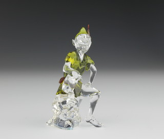 A Swarovski Crystal coloured figure of a seated Peter Pan 3 1/2", boxed 