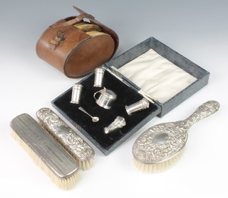 An Art Deco silver 5 piece condiment set Birmingham 1931, a pair of silver backed hair brushes and 3 other brushes 