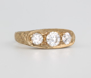 A 9ct yellow gold paste set 3 stone ring size Q
