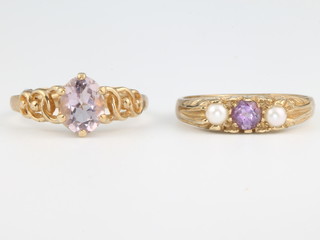 A 9ct yellow gold amethyst set ring size M 1/2 and a do. amethyst and seed pearl ring size O 