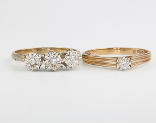 A 9ct yellow gold single stone diamond ring size O 1/2, a do. 3 stone diamond ring size N 