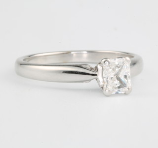 An 18ct white gold rectangular cut single stone diamond ring approx. 0.53ct size K 1/2.   Colour grade E/F, clarity VVS1 together with a GIA diamond certificate 