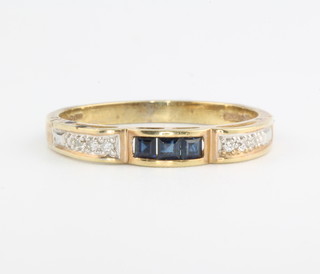 A 9ct yellow gold diamond and sapphire ring size Q