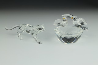 A Swarovski Crystal figure of a leopard 5" and a dish with 2 doves 3" 