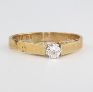 An 18ct yellow gold single stone diamond ring