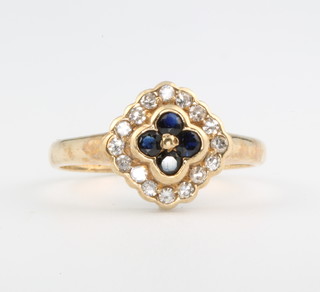 A 9ct yellow gold sapphire and diamond cluster ring size M 1/2