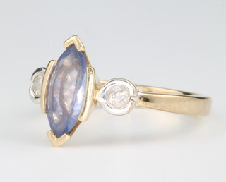 A 14ct yellow gold marquise cut tanzanite and diamond ring size O 