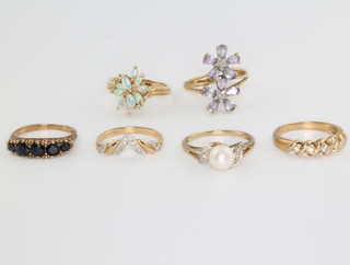 Six 9ct yellow gold gem set rings size Q