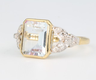 An 18ct yellow gold aquamarine and diamond ring size L 